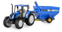 Traktor New Holland T5 z przyczepą przeładowczą